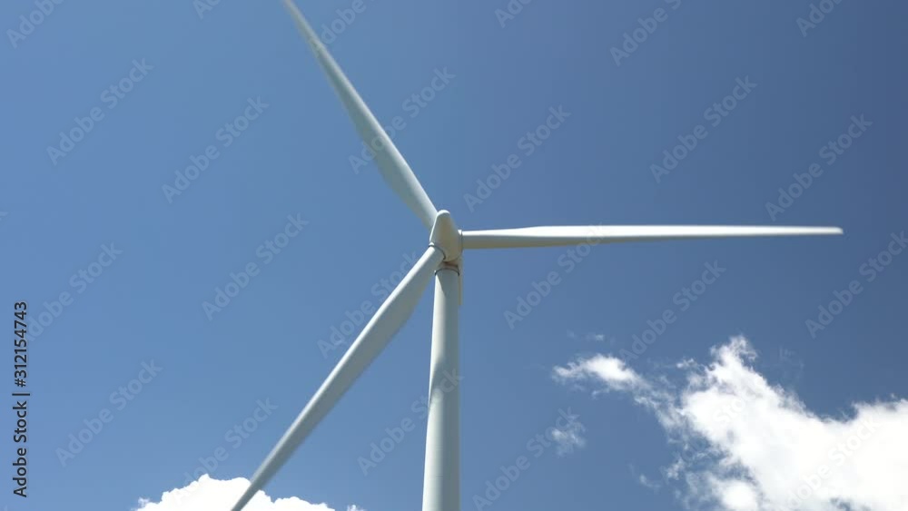 Close up of a Wind turbine on a blue sunny day Close up of a Wind turbine on a blue sunny day