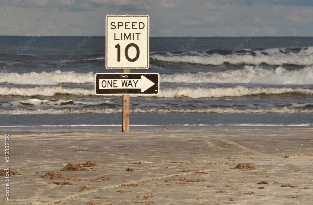 Florida beach with signs for driving on beach