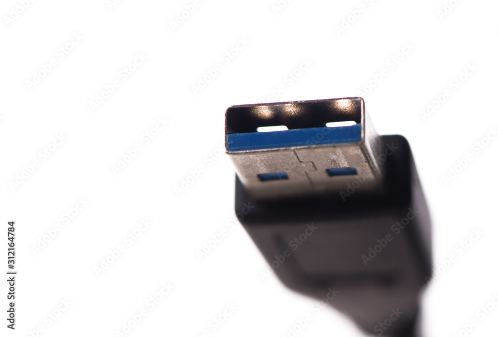 USB cable connector with blurred cable close up USB cable connector with blurred cable close up