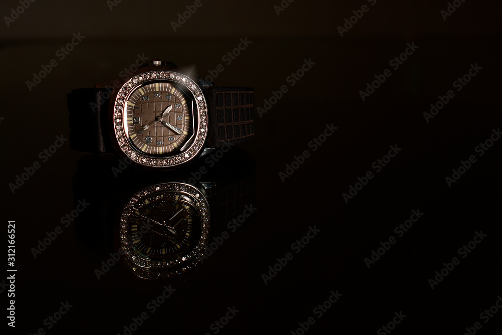 Luxury watches On the reflection glass floor Luxury watches On the reflection glass floor