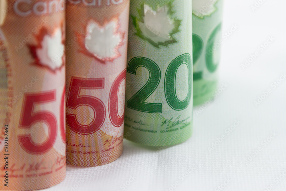 Canadian dollar bills or banknotes. Canadian currency Canadian dollar bills or banknotes. Canadian currency