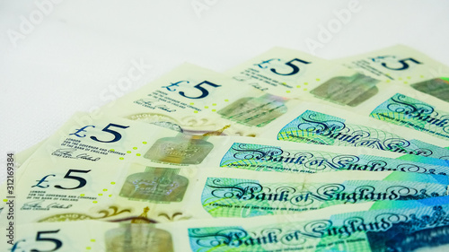 British £5  pounds sterling bills or banknotes