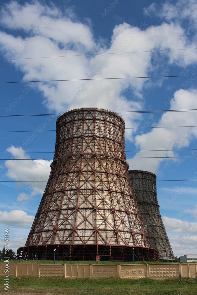 large pipe cooling tower at the thermal power plant for the production of heating engineering construction CHP large pipe cooling tower at the thermal power plant for the production of heating engineering construction CHP