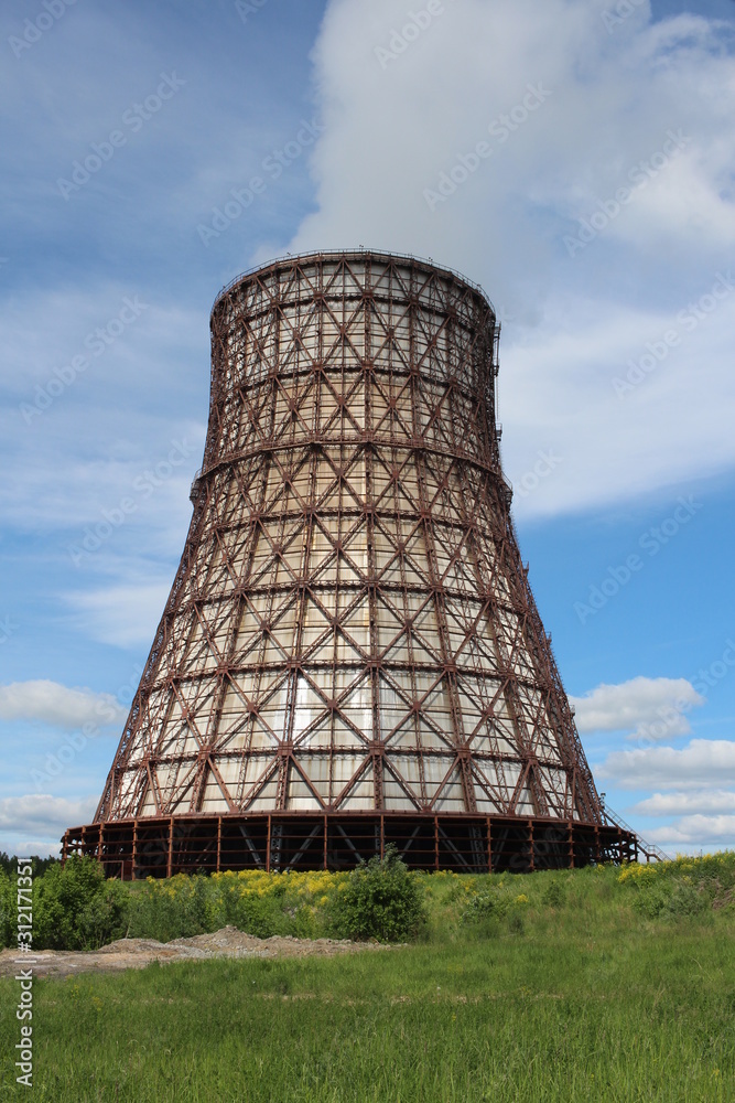 large pipe cooling tower at the thermal power plant for the production of heating engineering construction CHP