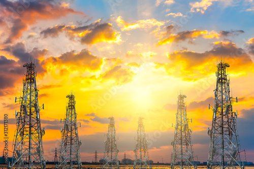 telecommunication tower at sunset sky background