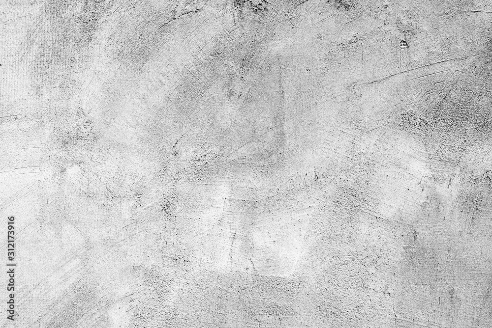Fototapeta premium Texture of a concrete wall with cracks and scratches which can be used as a background