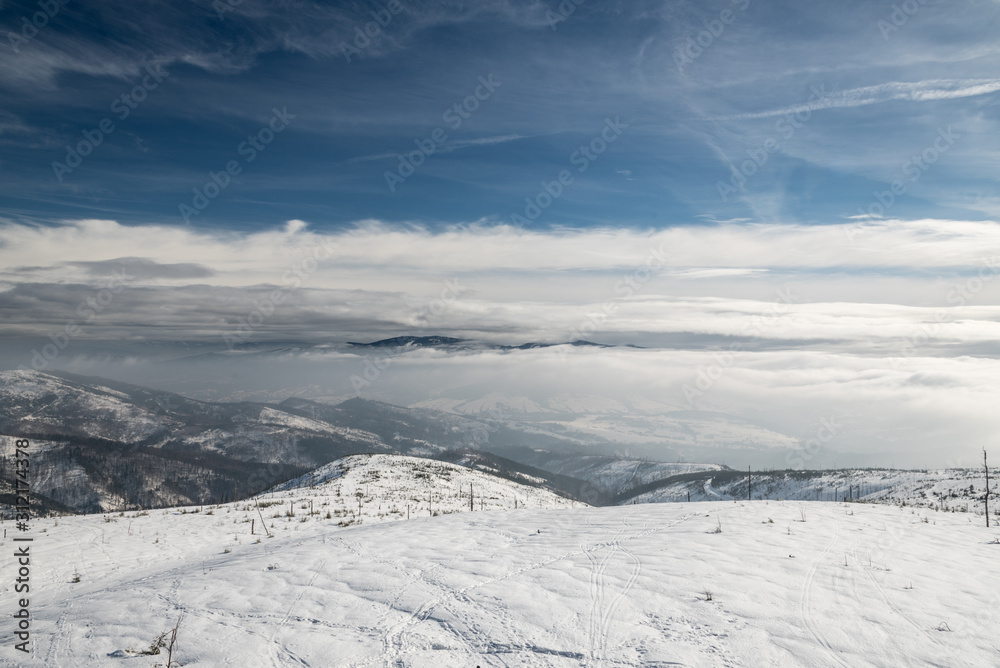 view from Barania Gora hill in winter Beskid Slaski mountains in Poland