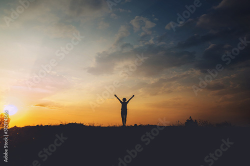 Young woman relaxing in summer sunset sky outdoor. People freedom style.