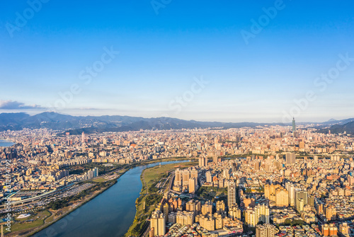 Taipei City Aerial View - Asia business concept image, panoramic modern cityscape building bird’s eye view under daytime and blue sky, shot in Taipei, Taiwan. © yaophotograph