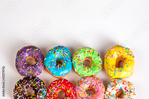 colorful doughnuts white background studio