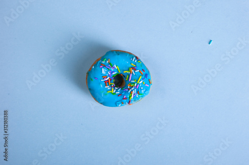colorful doughnut blue background studio