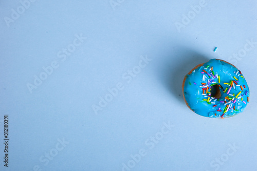 colorful doughnut blue background studio