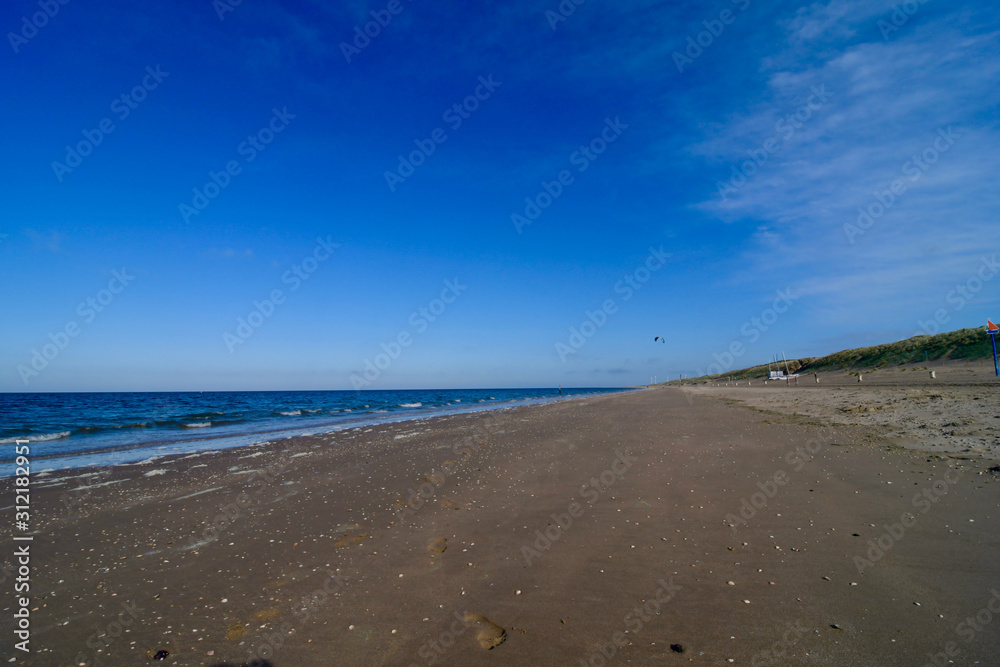 beach holland sand blue sky sunny day wind