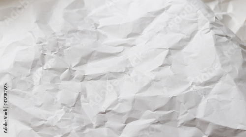 crumpled white paper as background