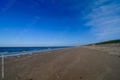 beach holland sand blue sky sunny day wind