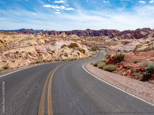 Road view White Domes Road with desert scenery in Valley of FIre State Park, Nevada, near Las Vegas, sunny spring day, USA