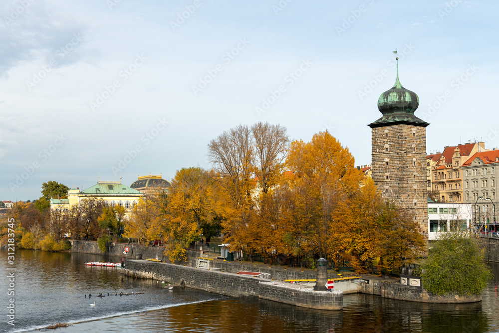 Water tower near river Vltava in Prague on a cloudy day in autumn