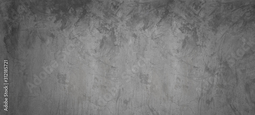Dark and gray cement wall background