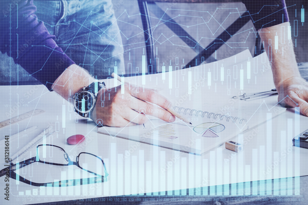 Financial trading chart double exposure with man desktop background.