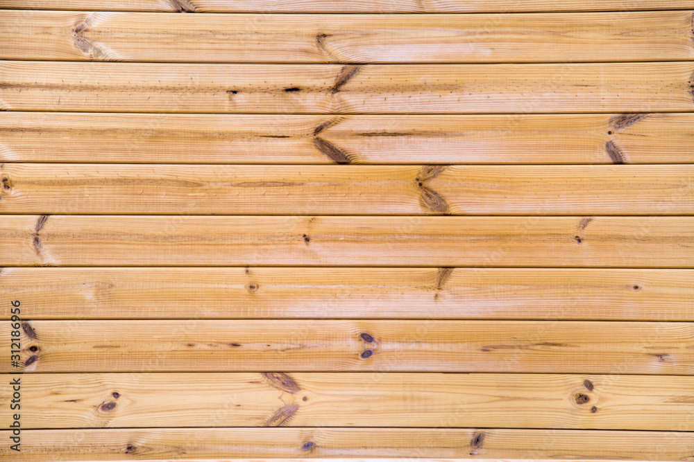 Obraz premium Background of planed larch planks, thermo clapboard, with a beautiful pattern of the structure of trees with knots. Design backgrounds texture construction. construction, wood, brown, wall, rough, tim
