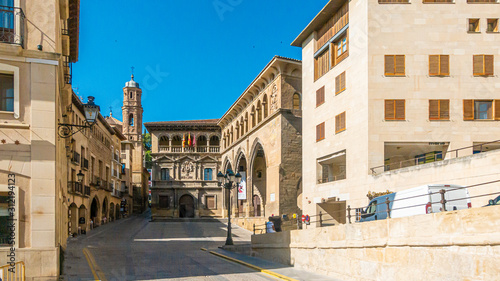 View on central plaza of historic town Alcaniz in Spain during daytime