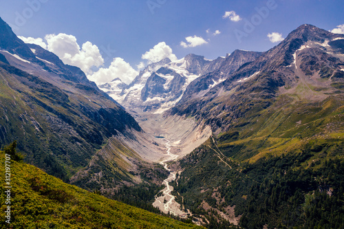 Scenic view on some high peaks of the Pennine alps near Val 'd Anniviers and glaciers running down to the valley in summer © Steven
