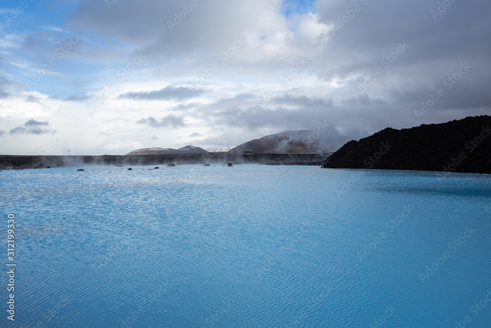 Blue lagoon - Volcanic formations filled with white-blue warm water. Iceland Blue lagoon - Volcanic formations filled with white-blue warm water. Iceland