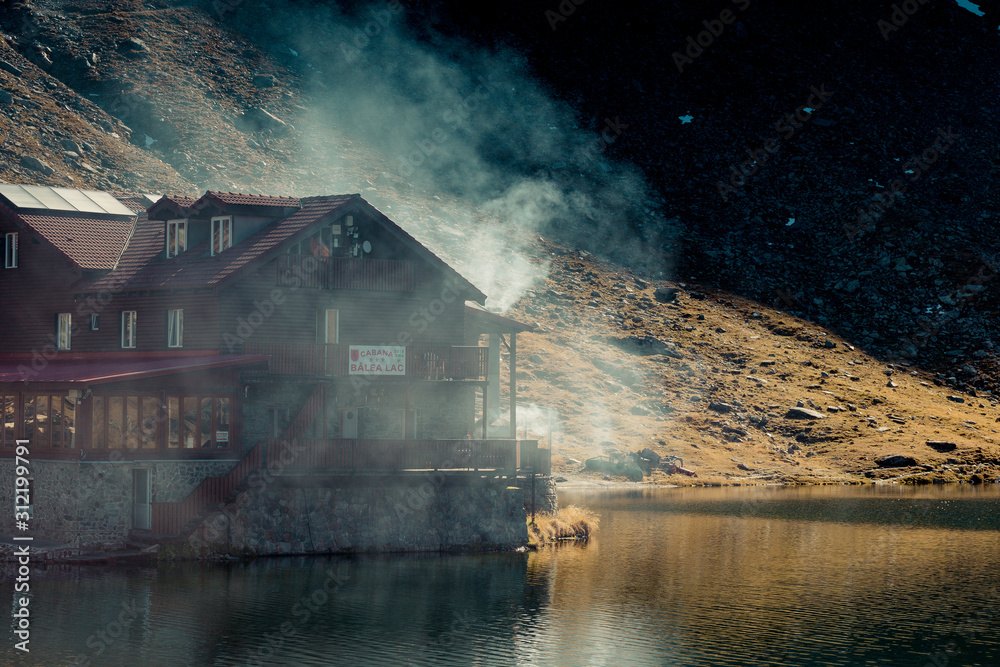 Fototapeta premium Lonely hut in the mountains
