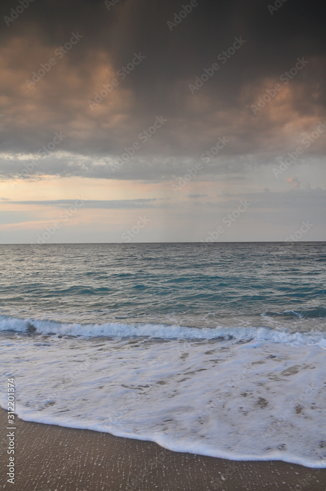 Beautiful sunset on sea during a storm