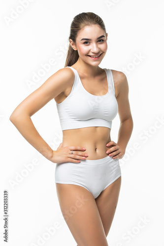 Beautiful woman with perfect body in white underwear isolated on white background