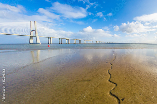 Valokuva Cityscape of the Parque das Nações (Nations Park) and the Vasco de Gama Bridge