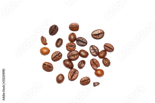 Coffee beans. Distributed on a white background.