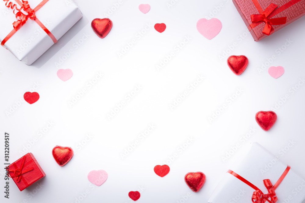 Valentine's Day background. .with gifts and hearts, in red and white, top view. San valentin and love concept.