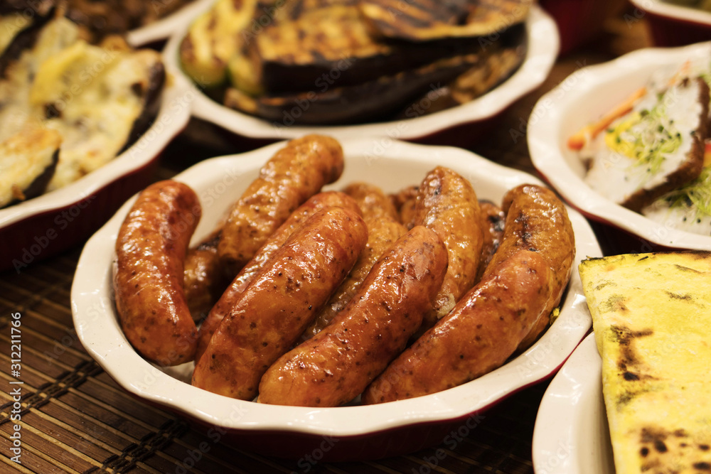 Street food at the fair homemade grilled sausages Street food at the fair homemade grilled sausages