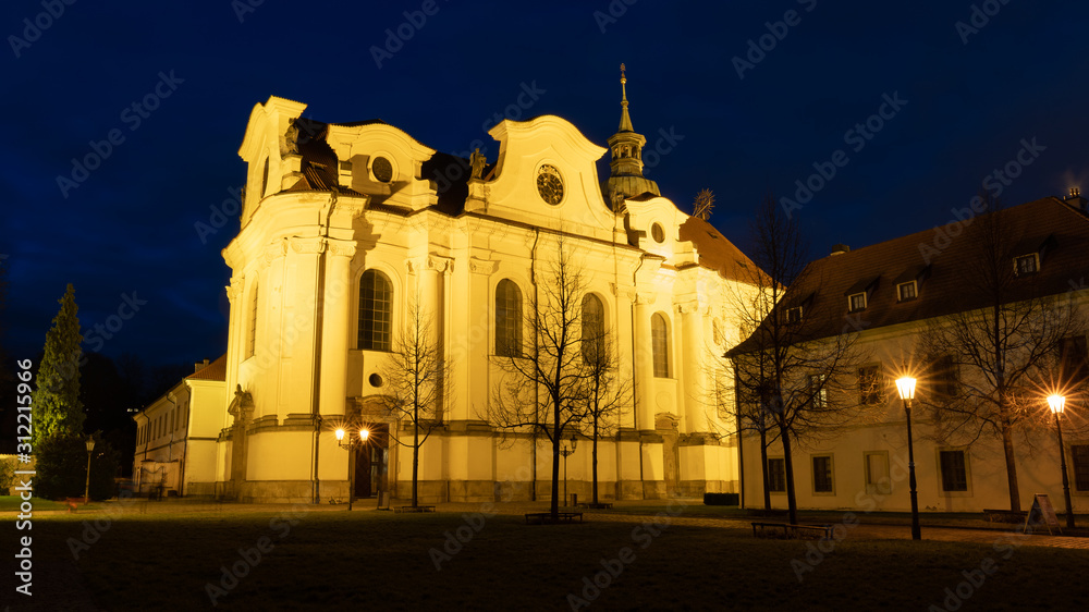 Night view of Brevnov monatery in Prague, Czech Republic. Benedictine Archabbey of St Adalbert and St Margaret was founded in 993 AD