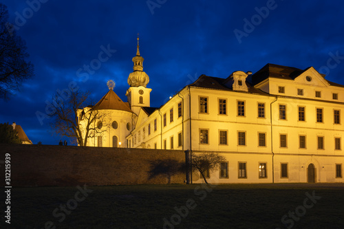 Night view of Brevnov monatery in Prague, Czech Republic. Benedictine Archabbey of St Adalbert and St Margaret was founded in 993 AD