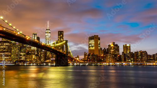 Fototapeta Naklejka Na Ścianę i Meble -  View of Manhattan skyline and Brookyn bridge from Brooklyn side after sunset , New york city