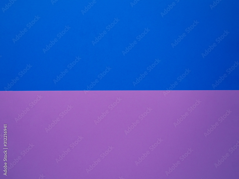 Pink and blue paper texture abstract background with copy space for your design. Two trendy colored papers arranged in parallel top view. Can be used for greeting cards, banners.