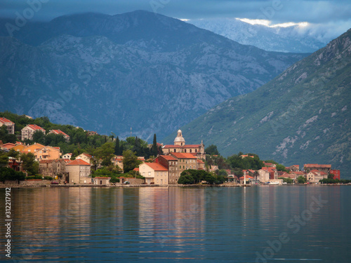 city in Kotor bay on the sunset with beautiful mountains