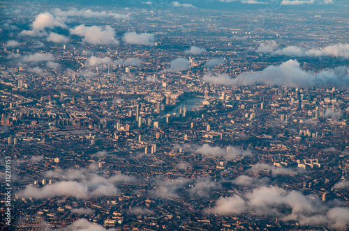 Photography Aerial view of central London through the clouds