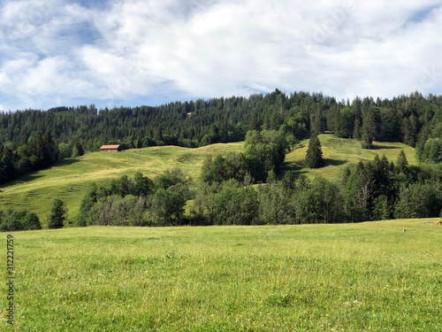 Traditional architecture and farmhouses in the Sihltal valley and by the artifical Lake Sihlsee, Studen - Canton of Schwyz, Switzerland photo