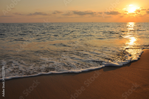 Sunset on the sea at low tide