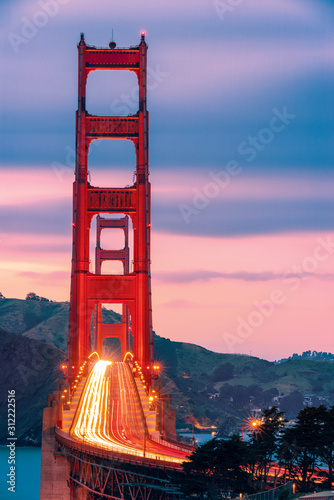 Golden Gate noght view of car light  trails photo