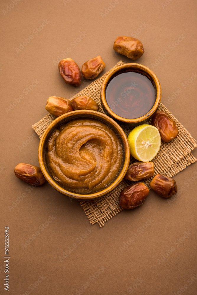 Dates Face mask for supple, smooth and clear skin with ingradients like fresh raw khajoor, lemon and honey. selective focus Dates Face mask for supple, smooth and clear skin with ingradients like fresh raw khajoor, lemon and honey. selective focus