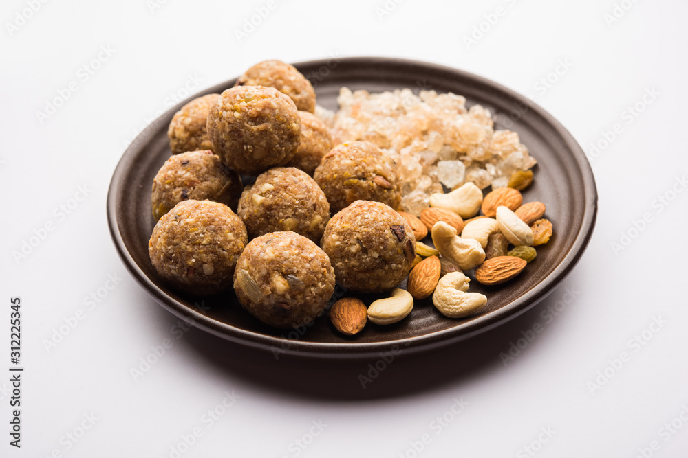 sweet Dink laddu also known as Dinkache ladoo or gond ke laddoo made using edible gum with dry fruits sweet Dink laddu also known as Dinkache ladoo or gond ke laddoo made using edible gum with dry fruits