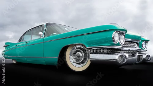 Obraz  z motywem Side view of a classic american car from the fifties.