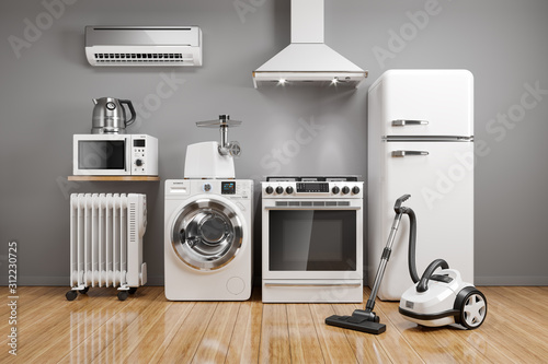 Set of home kitchen appliances in the room on the wall background. photo