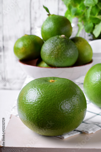 Whole sweetie fruit against the white background