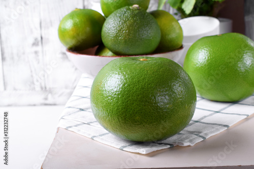 Whole sweetie fruit against the white background