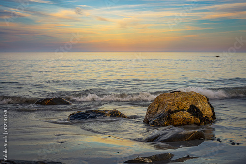 Long exposure seascape along Nova Scotia s rocky seacoast shoreline.